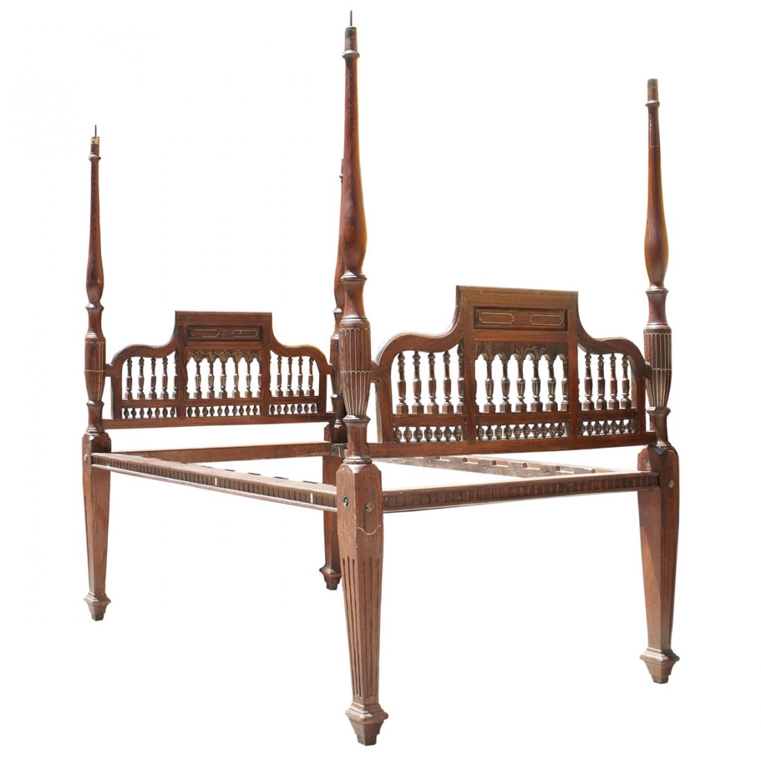 An Anglo Indian Brass Inlaid Rosewood Four Poster: An Anglo Indian Brass Inlaid Rosewood Four Poster Bed, circa 1820, having four tapering posts supporting a canopy frame; the head and foot boards of pediment form. Height 83 1/2 x width 53 x depth 79