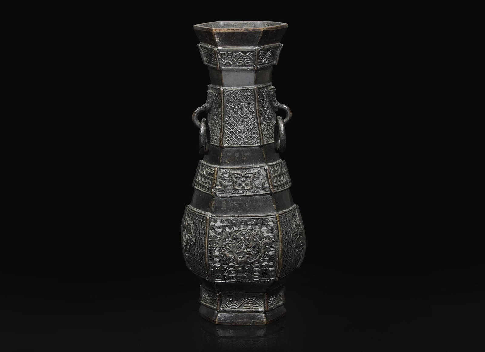 A Chinese patinated bronze hexagonal vase, Yuan to Ming Dynasty 加漆六方% (1 of 3)