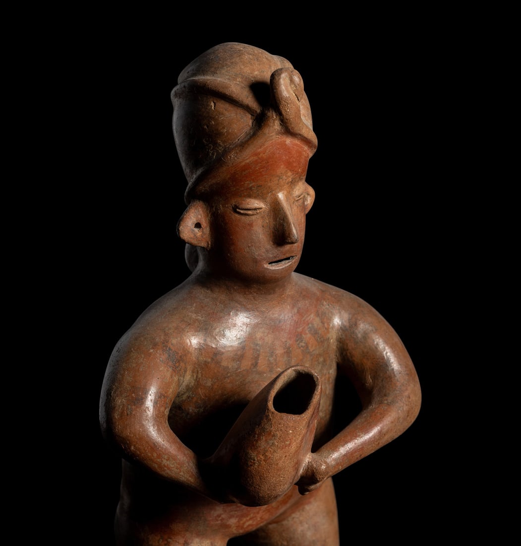 A Colima Standing Figure Holding a Pot (1 of 3)