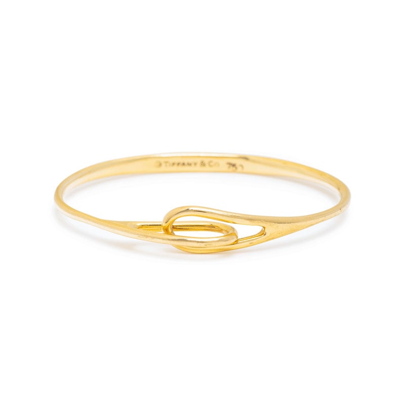 TIFFANY & CO., YELLOW  GOLD BANGLE BRACELET (1 of 2)