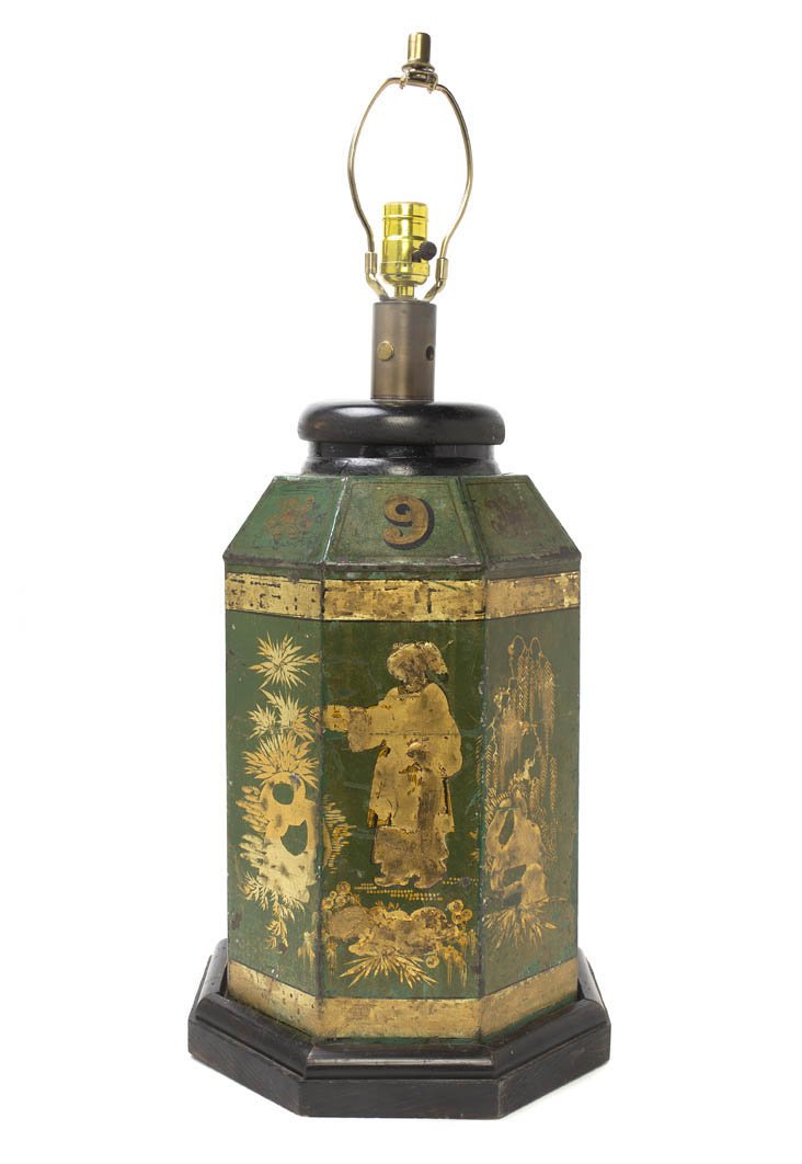 An English Tole Tea Canister, Height 22 1/2 inches.: An English Tole Tea Canister, of octagonal form, having figural Chinoiserie decoration in gilt on a green ground, mounted as a lamp. Height 22 1/2 inches. Property from the Estate of Helen and C. Nich