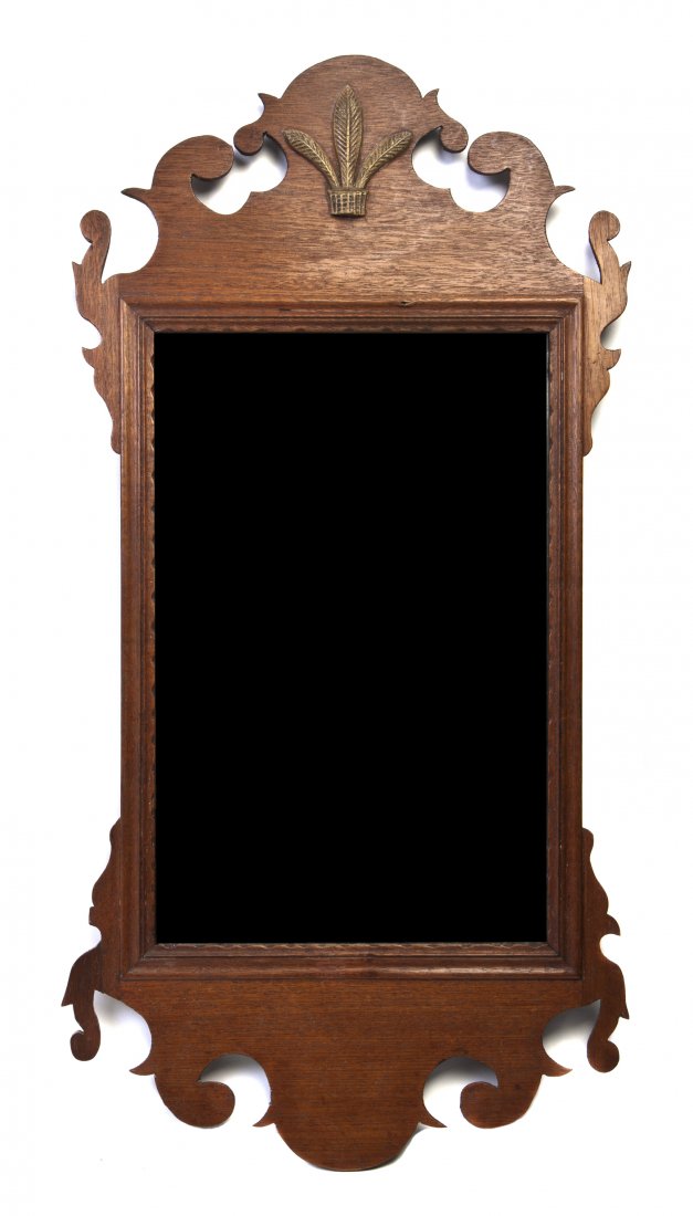 A Group of Four Chippendale Style Walnut Mirrors, H: A Group of Four Chippendale Style Walnut Mirrors, each having a carved frame set with a vertical rectangular plate. Height of tallest 25 3/8 inches. Property from the Estate of William P. Tarzwell, El