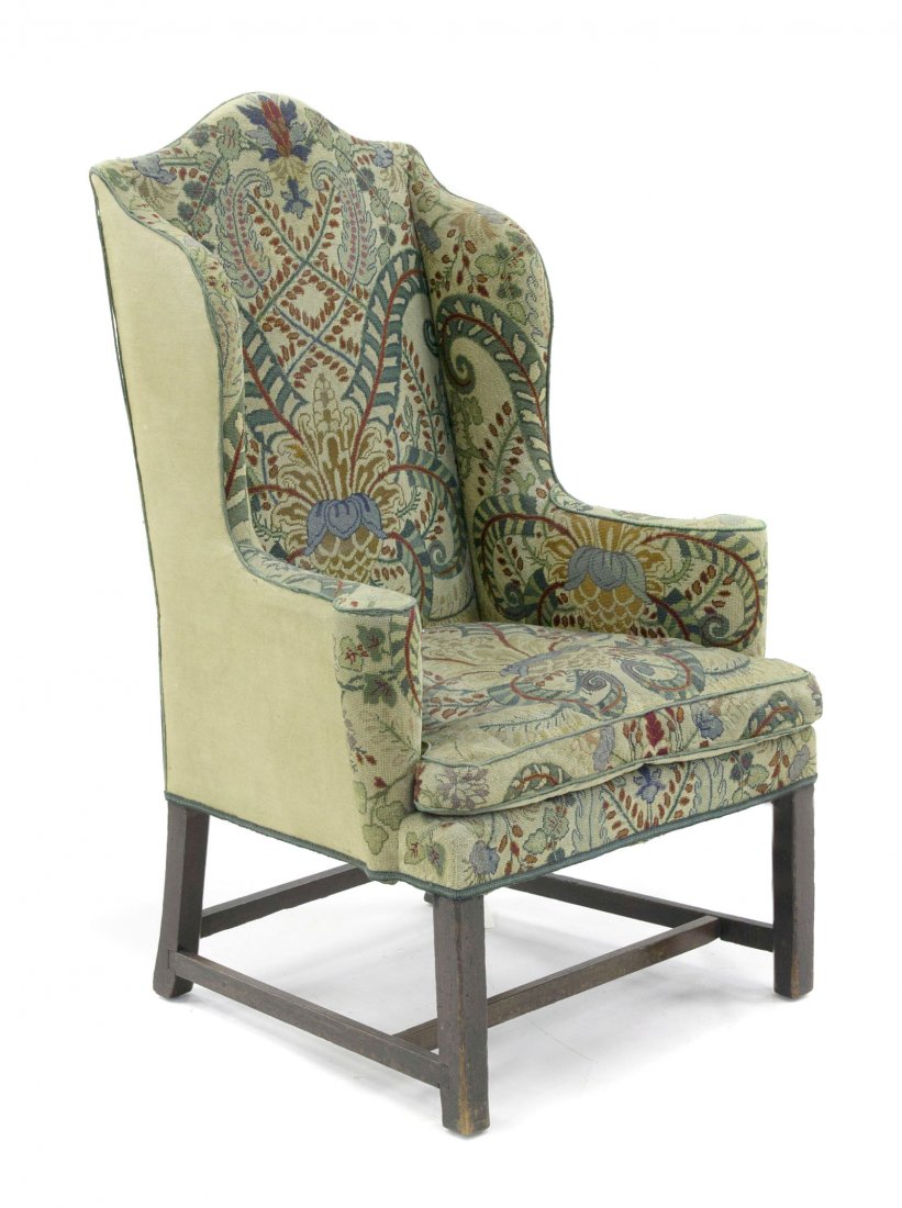 A Hepplewhite Style Wingback Armchair, Height 46 1: A Hepplewhite Style Wingback Armchair, having a needlepoint upholstered back, arms and seat, raised on square legs joined by stretchers. Height 46 1/2 inches. Property from the Chicago Historical Soci