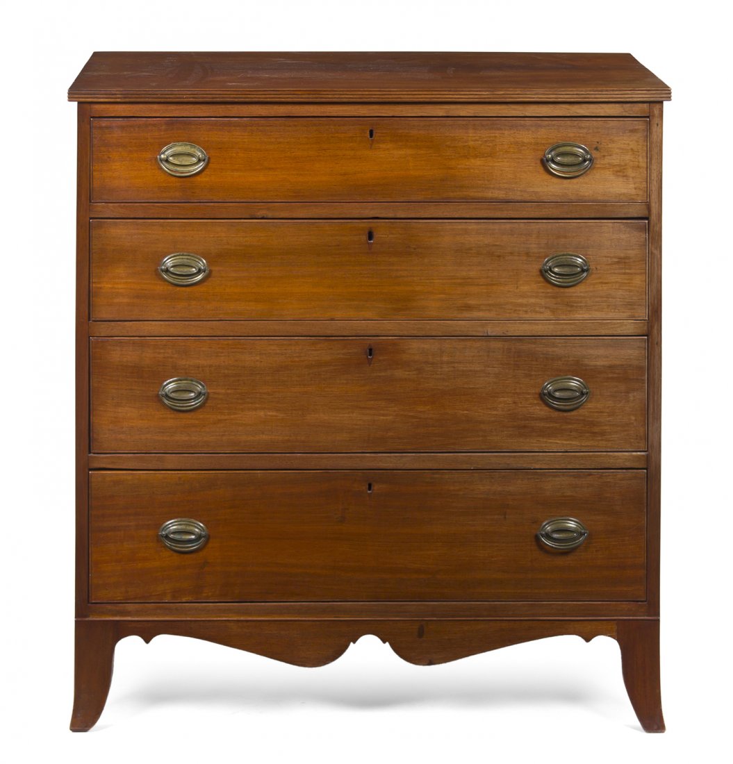 An American Federal Style Mahogany Chest of Drawer: An American Federal Style Mahogany Chest of Drawers, having a rectangular top over four graduated drawers above a shaped apron, raised on slightly splayed legs. Height 40 7/8 x width 38 3/8 inches. Pr