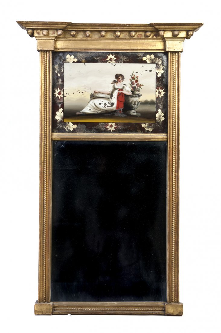An American Federal Style Tabernacle Mirror, Heigh: An American Federal Style Tabernacle Mirror, in a shaped giltwood frame set with an eglomise plate of a girl reclining against an urn over a vertical rectangular plate. Height 34 x width 21 1/4 inches