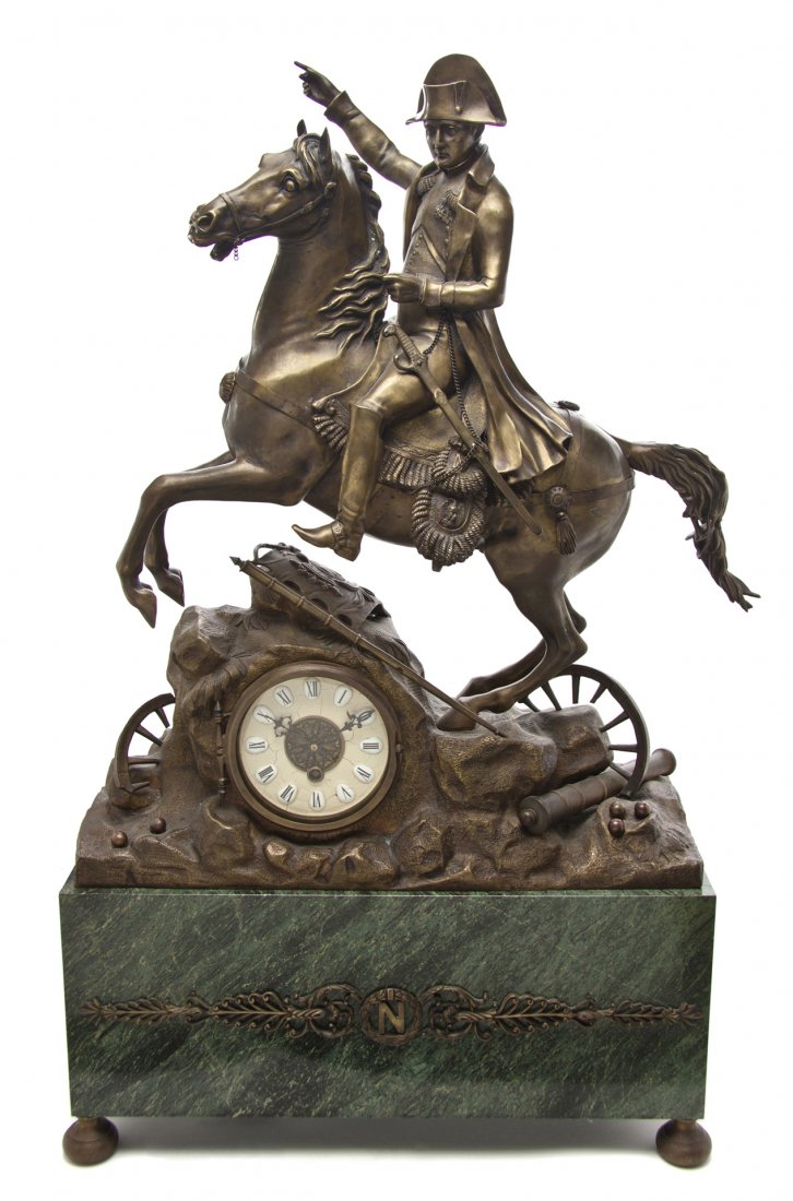 A French Bronze and Marble Figural Mantel Clock, H: A French Bronze and Marble Figural Mantel Clock, depicting Napoleon on horseback riding into battle, the segmented dial with enameled Roman numerals, set on a rectangular bronze mounted base, having r