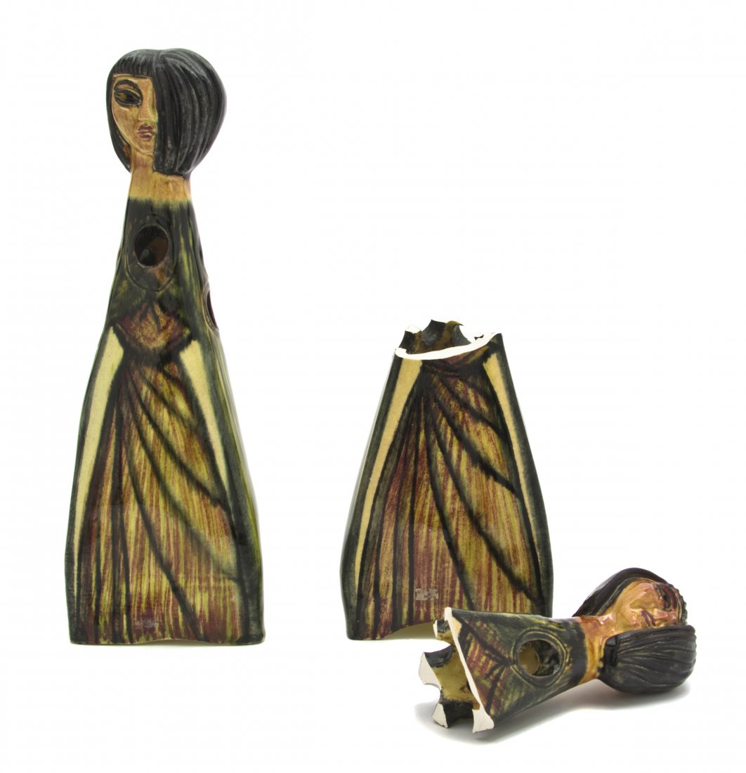 A Pair of Accolay Ceramic Figures, Height of talle: A Pair of Accolay Ceramic Figures, each depicting a stylized standing woman with polychrome decoration throughout, both signed and numbered to base. Height of taller 13 5/8 inches.