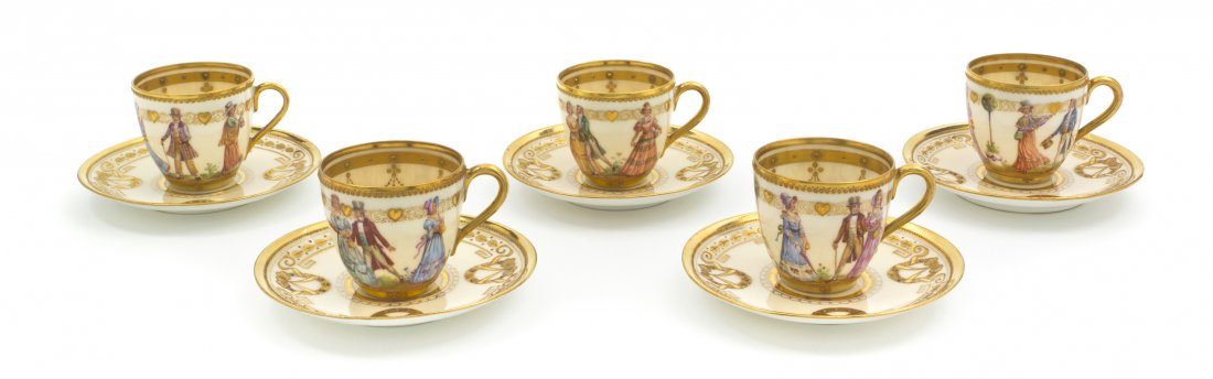 A Set of Twelve Dresden Porcelain Teacups and Sauc: A Set of Twelve Dresden Porcelain Teacups and Saucers, having gilt and polychrome figural decoration, each marked Dresden Made in Saxony to the base, contained in two cases. Height of teacup 2 1/8 inc