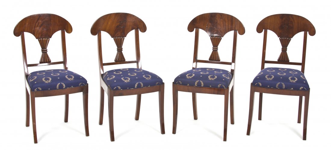 A Set of Four Biedermeier Side Chairs, Height 35 1: A Set of Four Biedermeier Side Chairs, having a shaped back crest over the double fan form splat above the upholstered seat, having a paper label affixed to the frame, raised on outswept legs. Height 