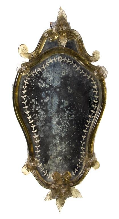 A Venetian Glass Mirror, Height 26 1/2 inches.: A Venetian Glass Mirror, having a floral and scrolled cornice above the shield form plate. Height 26 1/2 inches. Property from the Collection of Ernie Diebold, Rockford, Illinois