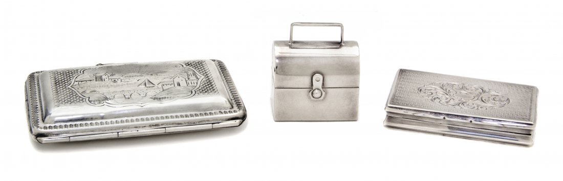 An English Silver Snuff Box, Edward Smith, Width o: An English Silver Snuff Box, Edward Smith, Birmingham, 1843, of rectangular form with engraved decoration, together with a continental silvered coin purse with an engraved harbor scene, apparently unm