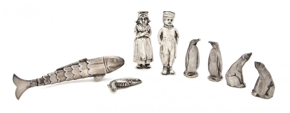 A Group of Silver Salt and Pepper Casters, Height: A Group of Silver Salt and Pepper Casters, having various makers and marks, comprising two in the form of polar bears and two in the form of penguins, David Andersen, Norway, one a crab claw, maker's