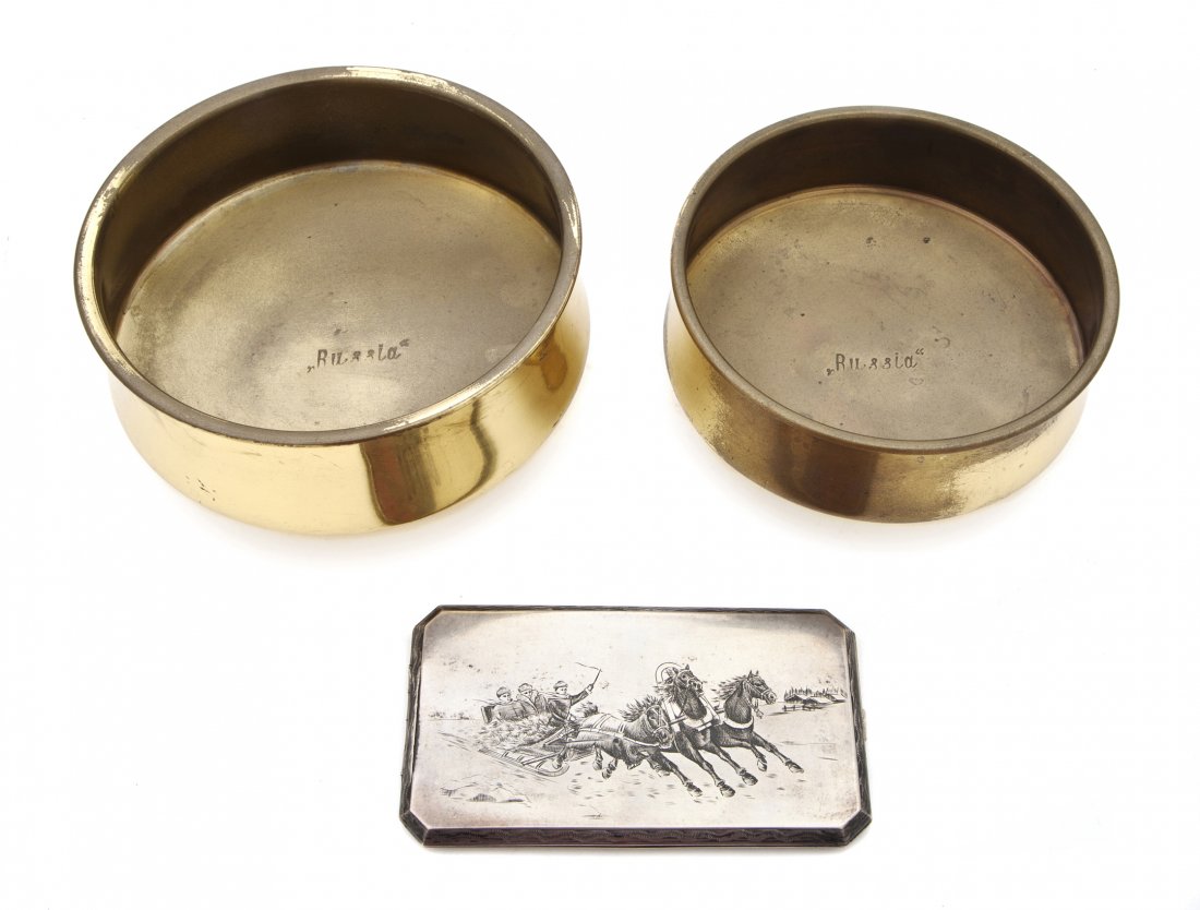 A Russian Silver Cigarette Case, Width of first 5 : A Russian Silver Cigarette Case, of rectangular form with canted corners decorated with a troika scene, together with two Russian brass bowls. Width of first 5 5/8 inches. Property from the Estate of 