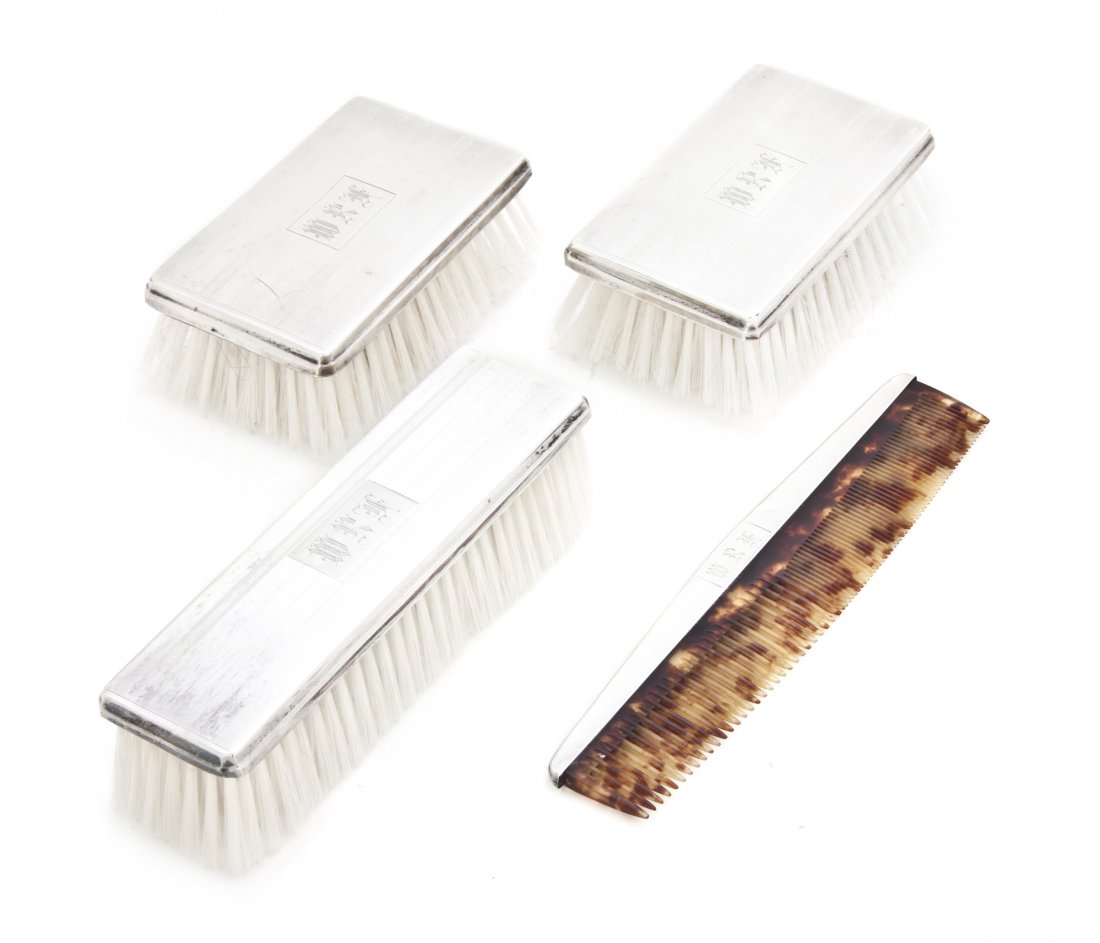An American Sterling Silver Mounted Dresser Set, B: An American Sterling Silver Mounted Dresser Set, Birks, comprising three brushes and a faux tortoise shell comb, each monogrammed. Length of longest 7 3/8 inches.