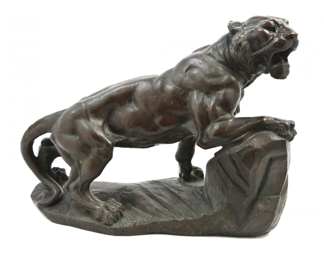 A Continental Bronze Animalier Figure, M. Antonia: A Continental Bronze Animalier Figure, M. Antonia Faille, depicting a tiger, set on a naturalistic conforming rocky base. Width 21 1/4 inches.