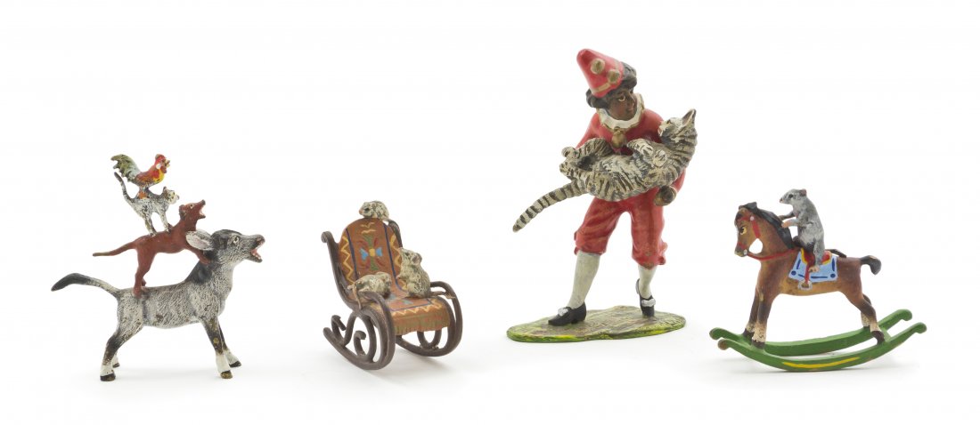 Four Austrian Cold Painted Bronze Animalier Group: Four Austrian Cold Painted Bronze Animalier Groups, comprising the Bremen Town Musicians, having a stack of animals with a rooster over a cat above a dog on a donkey, a child in a clown outfit holding