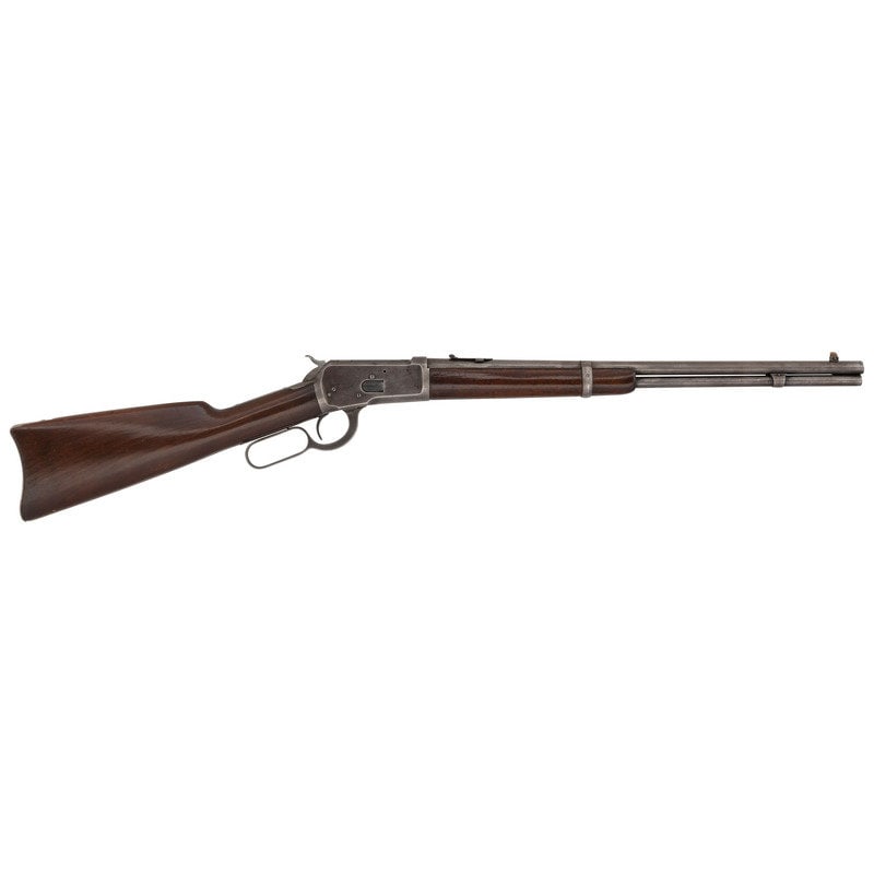 ** Winchester Model 1892 Rifle: ** Winchester Model 1892 Rifle .32 WCF. 20" barrel length. SN: 395598 (Mfg. ca.1907). Blued metal finish. Two piece walnut stock has a plain straight grip and forearm. Lever action rifle wit