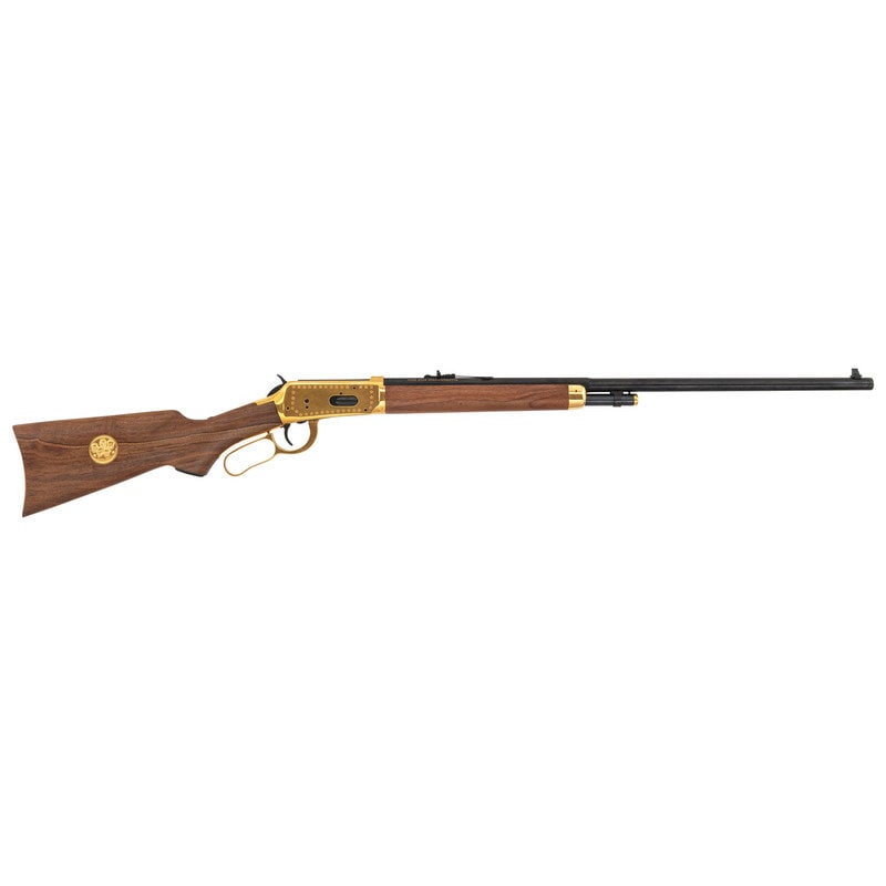 ** Winchester Lone Star Commemorative Rifle: ** Winchester Lone Star Commemorative Rifle .30-30. 26" octagonal to round barrel length. SN: LS32776. Blued metal finish and gold plated finish to frame and parts. Two piece walnut stock has a p