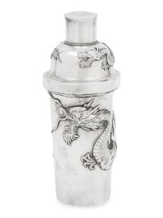 A Chinese Silver 'Dragon' Cocktail Shaker: A Chinese Silver 'Dragon' Cocktail Shaker Sing Fat, Hong Kong, Early 20th Century hallmarked to underside 12 ozt 8 dwt Height 8 1/4 inches. This lot is located in Chicago.