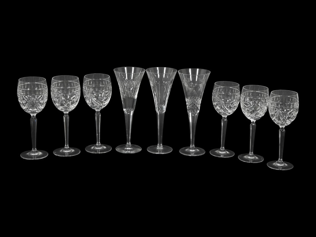 Three Sets of Waterford Cut Glass Stemware: Three Sets of Waterford Cut Glass Stemware comprising 12 Millennium champagne flutes, 12 Overture water goblets and 12 Overture wine stems; 36 items total. Height of tallest 9 1/4 inches. This lot is