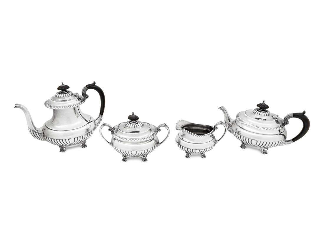 An American Silver Four-Piece Tea and Coffee Service: An American Silver Four-Piece Tea and Coffee Service Reed and Barton, Taunton, MA, 1937 Stratford pattern, comprising a coffee pot, teapot, creamer and sugar. each marked 'Sterling' on underside 80 oz