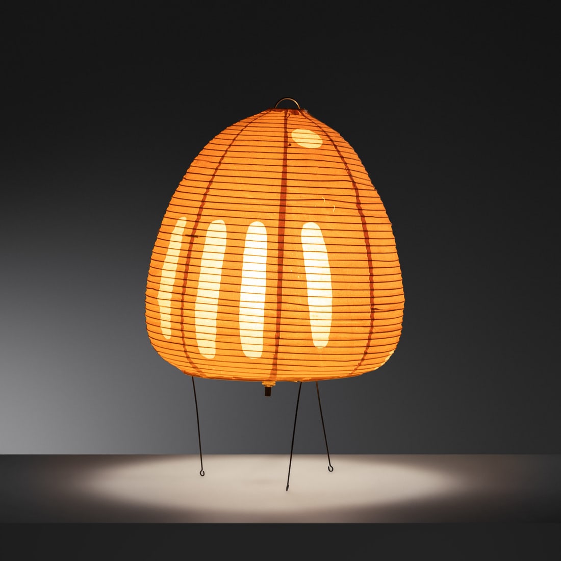 Isamu Noguchi (1904-1988) Akari Light Sculpture, model 1-A: Isamu Noguchi (1904-1988) Akari Light Sculpture, model 1-A washi paper, enameled steel, rubber with manufacturer's stamp H 15 1/2 x Dia 10 inches Property from the Phyllis Seltzer Trust, Cleveland, Oh