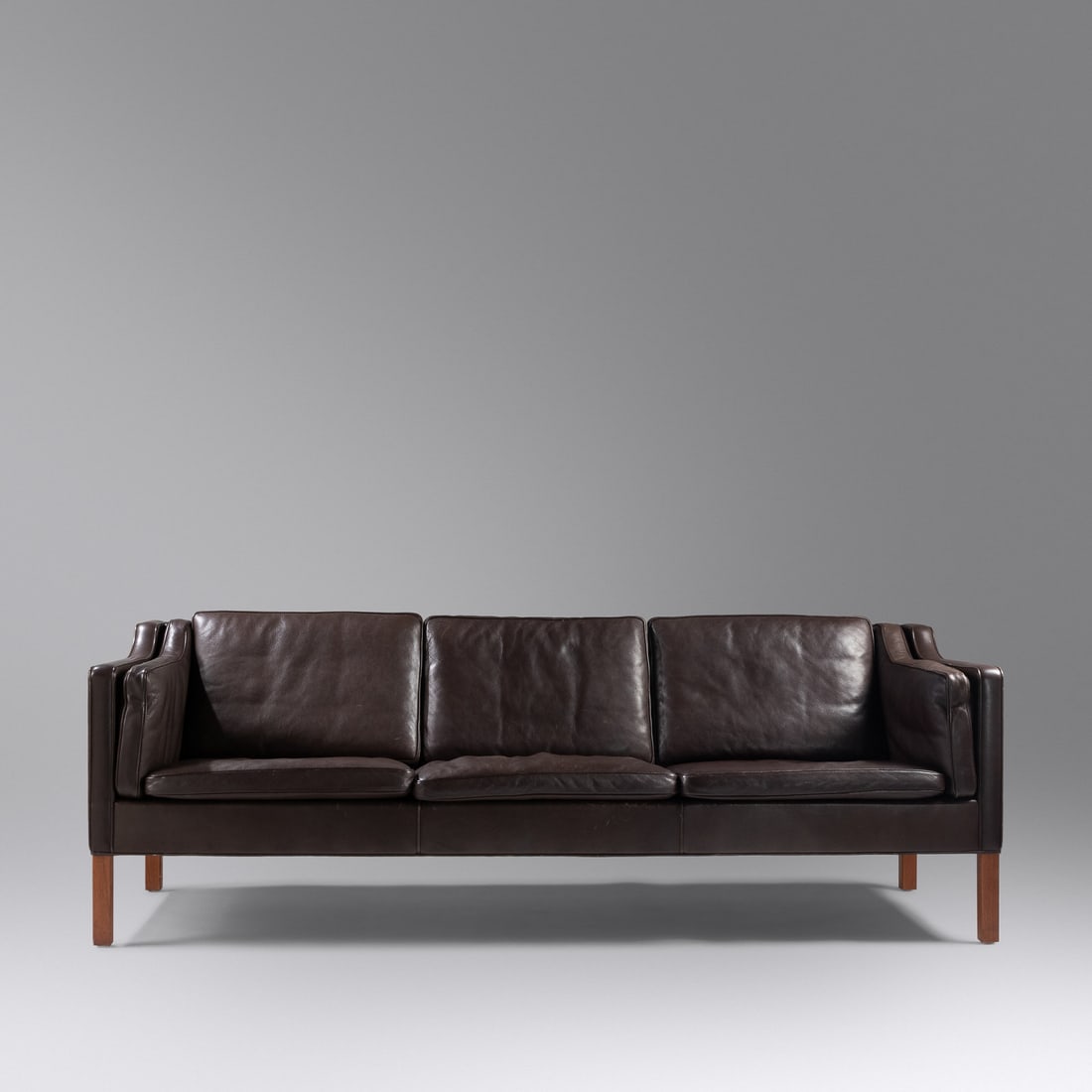 Børge Mogensen (1914-1972) 'Embassy' Sofa Fredericia, Denmark: Børge Mogensen (1914-1972) 'Embassy' Sofa Fredericia, Denmark leather, teak with manufacturer's label H 29 1/2 x W 86 x D 33 1/2 inches