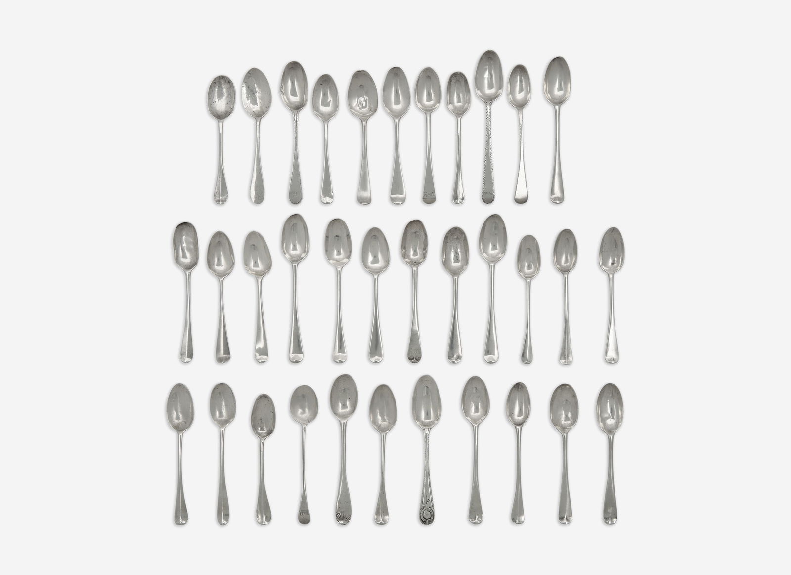 A collection of thirty-four silver coffee spoons, various makers, New York and New England, circa 17 (1 of 2)