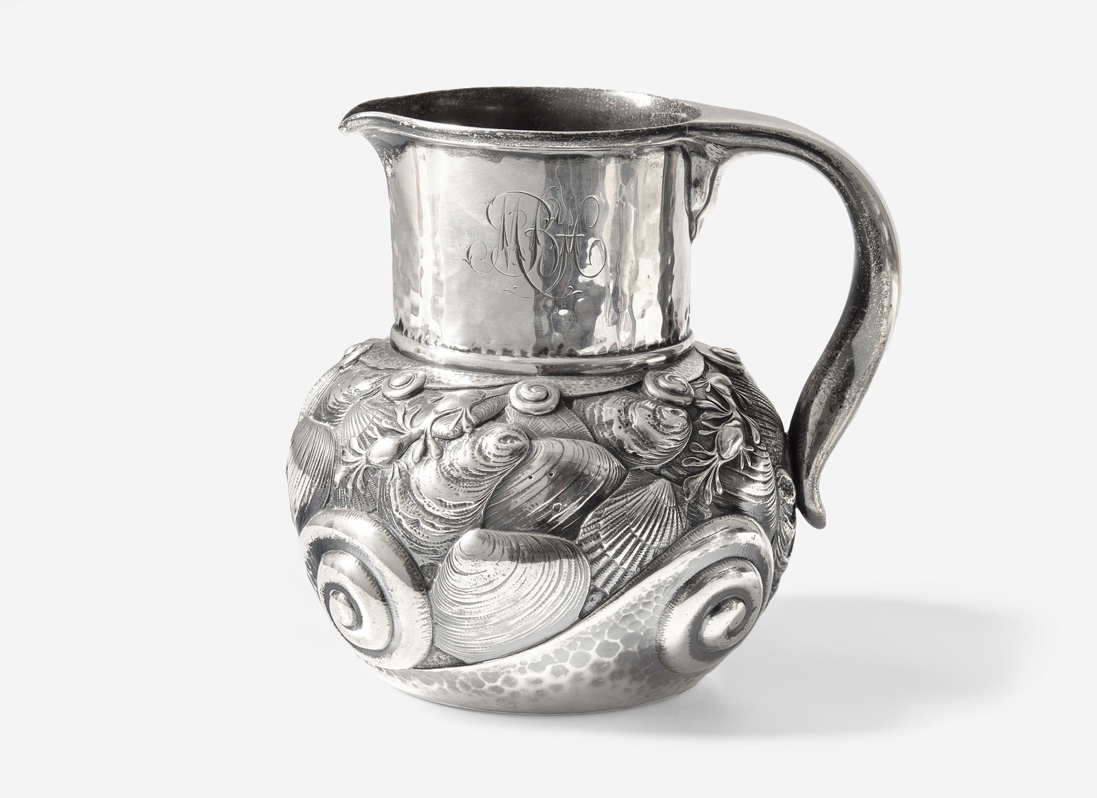 An Aesthetic Movement sterling silver water pitcher chased with sea life, Whiting Mfg. Co., New York (1 of 3)