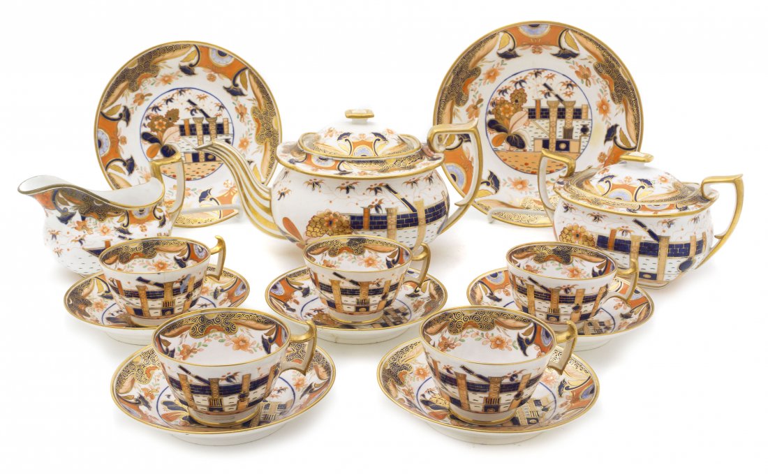A Spode Porcelain Tea Service, Diameter of largest : A Spode Porcelain Tea Service, in the Imari pattern, comprising a teapot, creamer, covered sugar, four cups, five saucers and two bowls, each apparently unmarked; 15 pieces total. Diameter of largest 