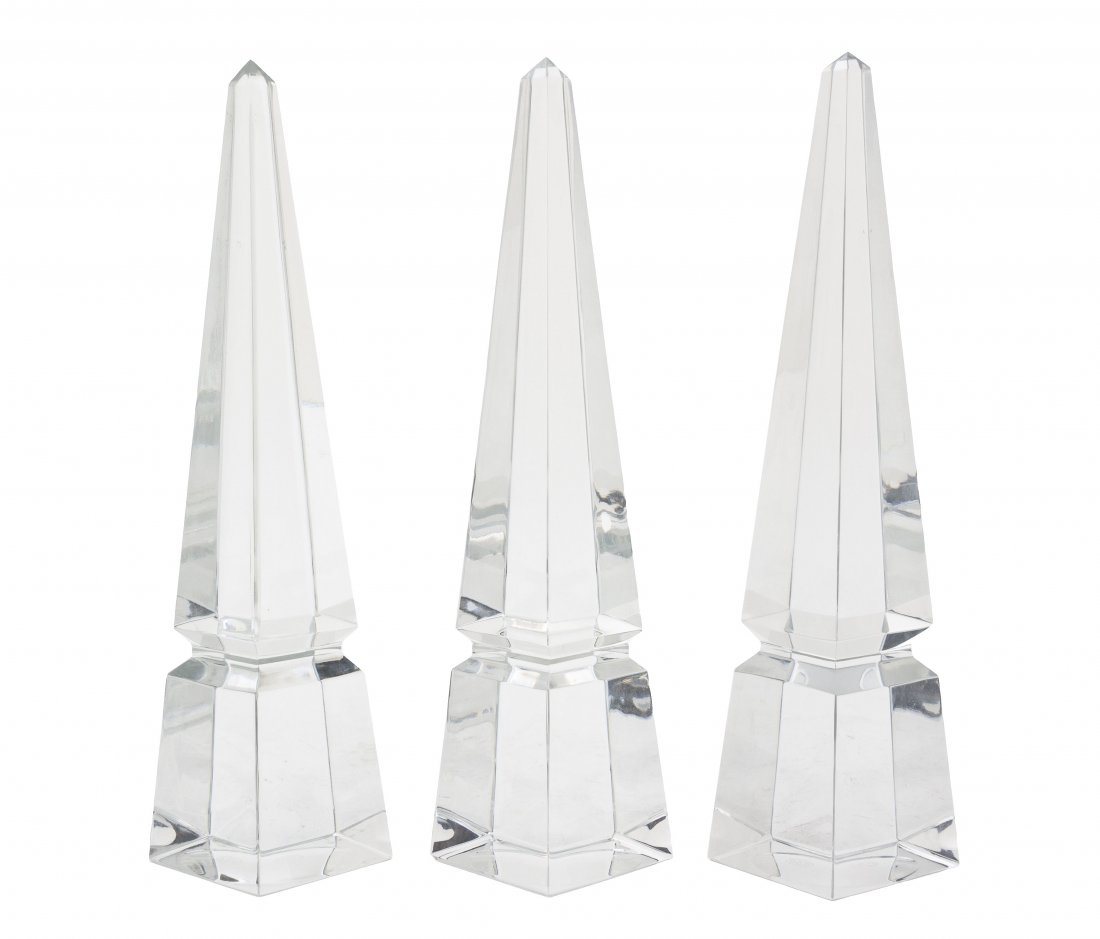 A Set of Three Baccarat Glass Obelisks, Height 10: A Set of Three Baccarat Glass Obelisks, of typical form. Height 10 inches.