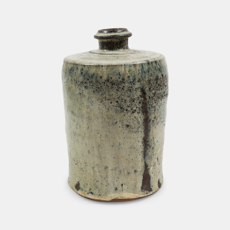 Gutte Eriksen (Danish, 1918-2008) Bottle-Form Vase, 1984: Gutte Eriksen (Danish, 1918-2008) Bottle-Form Vase, 1984 glazed earthenware with artist monogram H 8 1/2 x Dia 5 3/8 inches This lot is located in Chicago. The Collection of Philip and Judith Sieg, Be