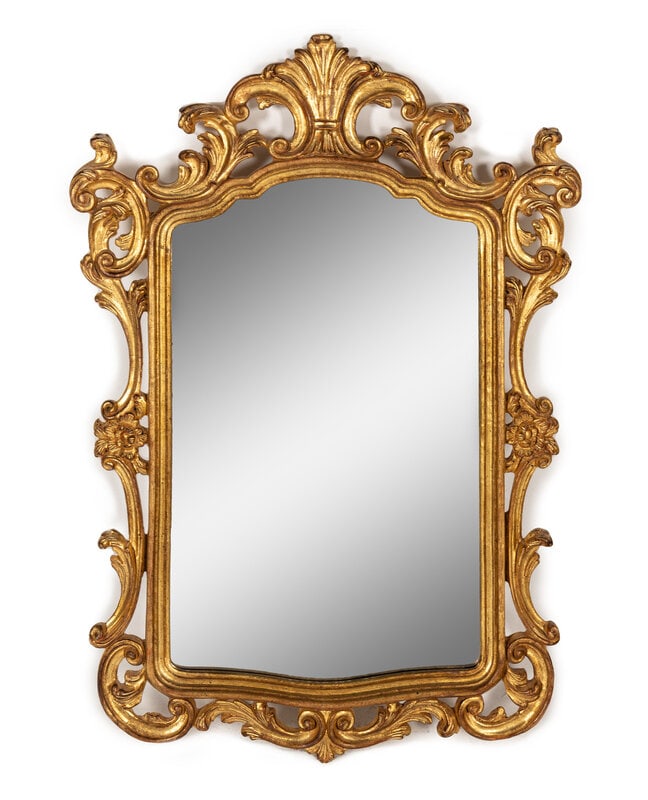 A Baroque Style Giltwood Mirror: A Baroque Style Giltwood Mirror 20th Century 43 1/2 x 28 1/2 inches. This lot is located in Chicago.