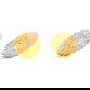 TIFFANY & CO., SCHLUMBERGER, YELLOW GOLD AND DIAMOND 'TAJ MAHAL' CUFFLINKS: TIFFANY & CO., SCHLUMBERGER, YELLOW GOLD AND DIAMOND 'TAJ MAHAL' CUFFLINKS Consisting of domed terminals containing four round brilliant cut diamonds. Mounted in 18 karat gold. 5/8 inch wide. Stamp: T