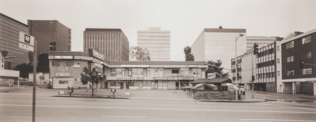 Catherine Opie (born 1961) Untitled #1, from the series "Mini Malls", 1997: Catherine Opie (born 1961)Untitled #1, from the series "Mini Malls", 1997Iris print, printed c. 1997, signed, titled, dated and numbered '4/5' in pencil on the verso.image: 16 x 41in. (40.5 x 51.5cm.)