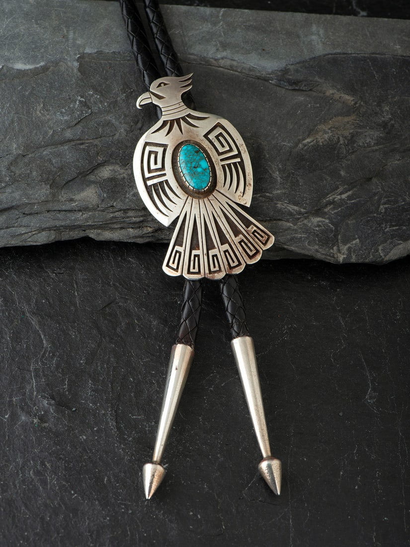 Lawrence Saufkie (Hopi, 1935-2011) Sterling Silver and Turquoise Thunderbird Bolo Tie (1 of 3)