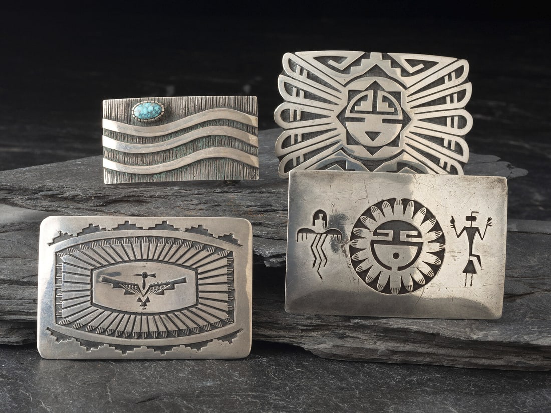 Navajo and Hopi Silver Belt Buckles: Navajo and Hopi Silver Belt Buckles second half 20th century lot of 4, includes: a small buckle, with wave design and set with a single offset Lone Mountain Turquoise cabochons; signed KEE for Kee Yaz