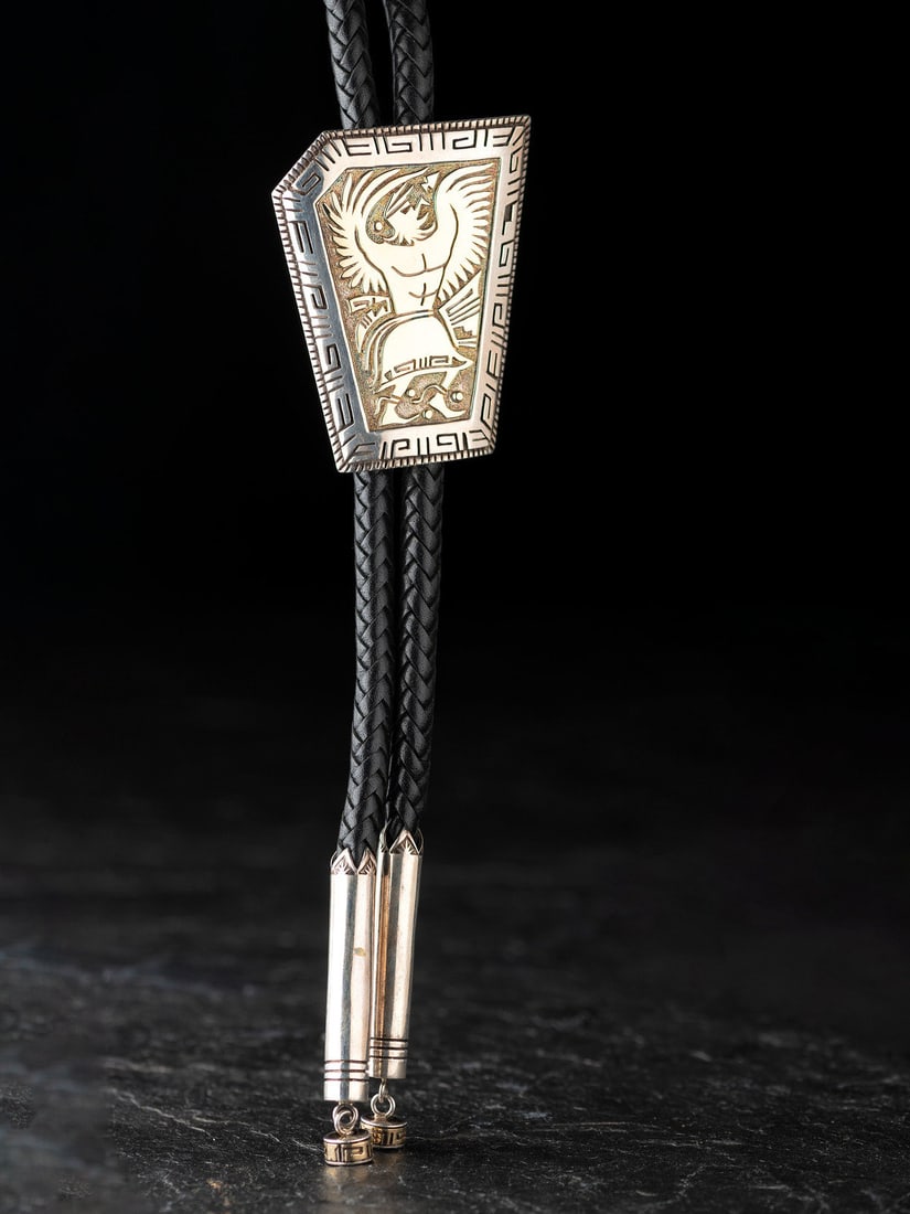 Herbert Taylor (Diné, 1951-1996) Sterling Silver and 14K Gold Eagle Dancer Bolo Tie (1 of 4)