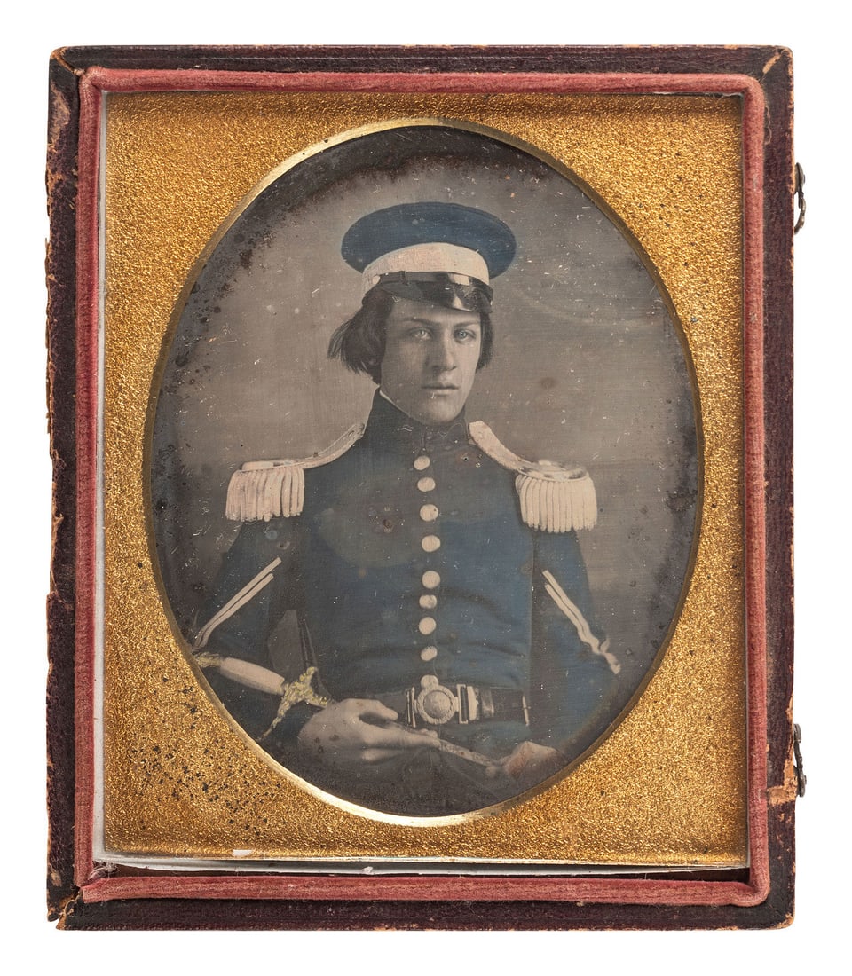 [MEXICAN WAR]. Quarter plate hand-tinted daguerreotype of a militiaman wearing a wheel cap and (1 of 2)