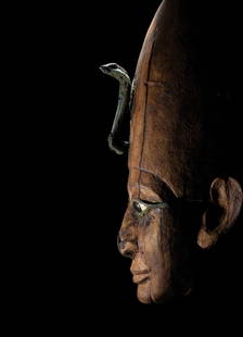 An Egyptian Wood Head of Osiris: An Egyptian Wood Head of Osiris Late Period, 26th Dynasty, 664-525 B.C. Height 19 inches (48.26 cm). Property from The Brummer Collection from Drs. John and Pat Laszlo, Atlanta, Georgia Provenance: