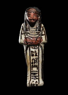 An Egyptian White Faience Ushabti for the Scribe Iuwy: An Egyptian White Faience Ushabti for the Scribe Iuwy New Kingdom, 19th Dynasty, 1307-1196 B.C. Height 5 inches (12.7 cm). Property from the Harer Family Trust Collection Provenance: Charles Ede, Lond