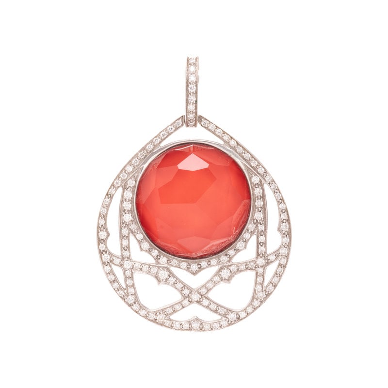 STEPHEN WEBSTER, CRYSTAL HAZE AND DIAMOND PENDANT: STEPHEN WEBSTER, CRYSTAL HAZE AND DIAMOND PENDANT Containing one round faceted rock crystal measuring 19.00 mm, numerous round brilliant cut diamonds weighing 2.00 carats total. 1 3/4 inches long.Stam