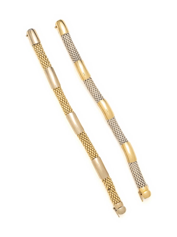 BICOLOR GOLD BRACELETS: BICOLOR GOLD BRACELETS Consisting of a yellow gold and a bicolor gold alternating bar and mesh link bracelets, measuring approximately 10.00 mm wide. Mounted in 14 karat gold. 8 inches long.Stamp: ITA