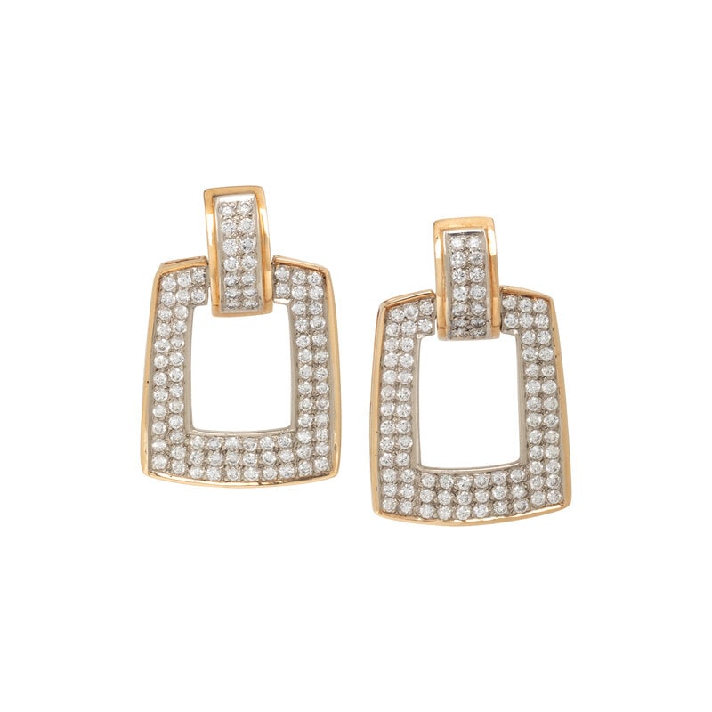 BICOLOR GOLD AND DIAMOND EARCLIPS: BICOLOR GOLD AND DIAMOND EARCLIPS Round brilliant cut diamonds weighing approximately 4.00 carats total, posts with clip backs. 14 karat bicolor gold. 1 1/4 inches long. Stamp: 14K. Gross 