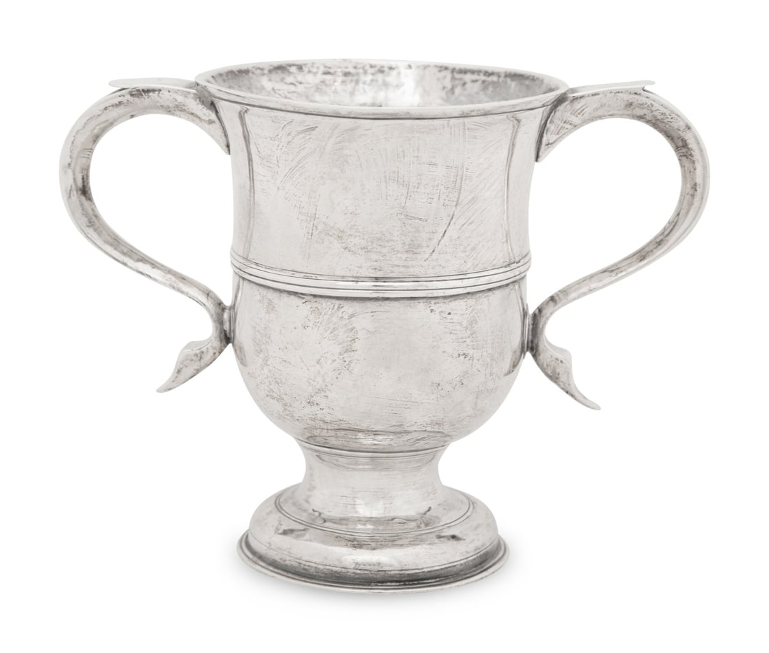 A George II Silver Loving Cup: A George II Silver Loving Cup James Smith, London, 1722 hallmarked for Sterling to body 10 ozt 18 dwt Height 5 1/2 x diameter 4 1/8 x width over handles 7 1/4 inches.