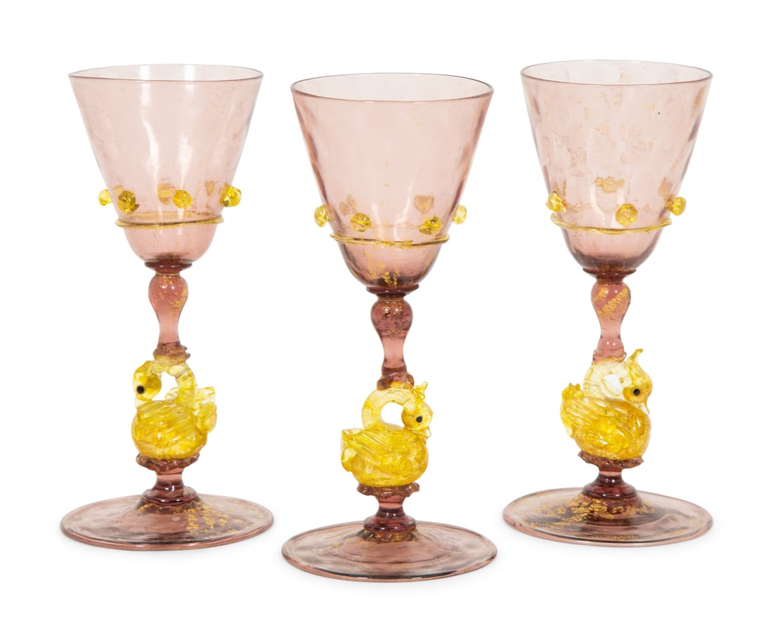 A Set of Nine Murano Glass Wine Glasses: A Set of Nine Murano Glass Wine Glasses 20th Century with swan-form knops. Height 6 1/2 inches.