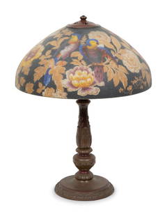 A Handel Reverse Painted Parrot Table Lamp: A Handel Reverse Painted Parrot Table Lamp 20th Century the shade stamped Handel on the bronze rim. Height 23 3/4 x diameter of shade 17 3/4 inches. Property from a Private Collection, Miami, Florida