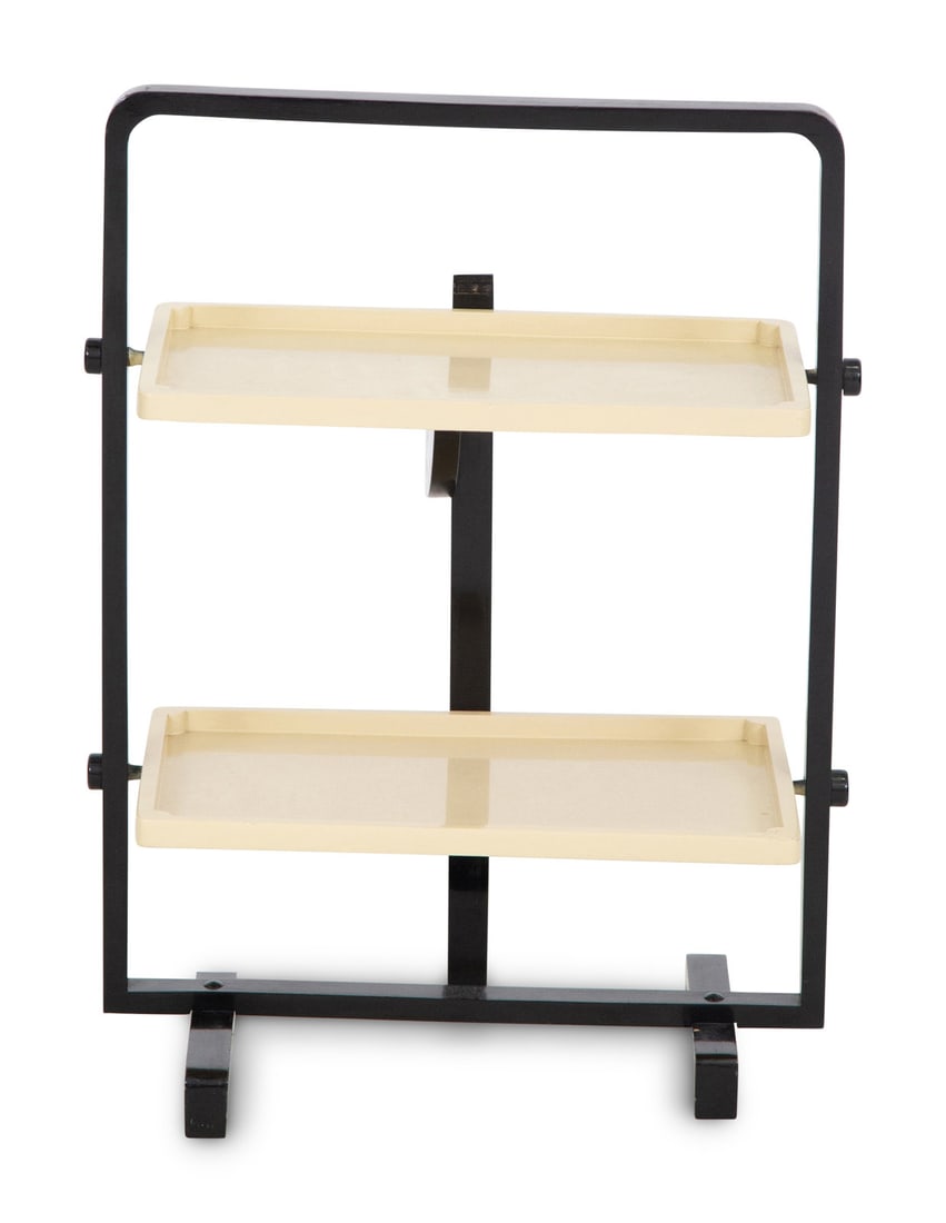 An Art Deco Lacquered Wood Silent Butler by André Groult: An Art Deco Lacquered Wood Silent Butler by André Groult Paris, Circa 1920s-1930s Height 26 3/4 x width 20 x depth 11 2/3 inches. This lot is located in Palm Beach.