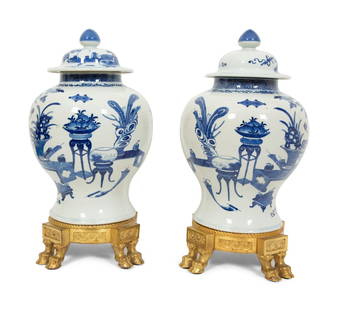 A Pair of Gilt Bronze Mounted Chinese Porcelain Jars: A Pair of Gilt Bronze Mounted Chinese Porcelain Jars 19th Century Height 17 3/4 inches. This lot is located in Palm Beach.