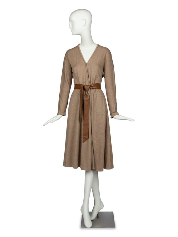 Halston Knit Dress and Leather Belt, 1970s: Halston Knit Dress and Leather Belt, 1970s Longsleeve, double-breasted dress in light brown wool-blend knit with leather belt. Dress features hook closures, gathering at waistline, and slash pockets a